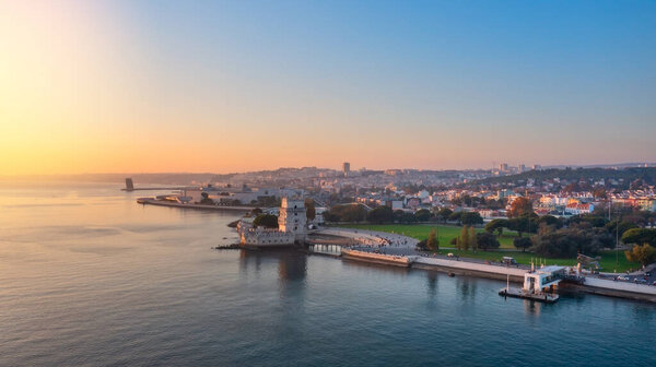 Aerial view of the Portuguese Historical Folk Patrimony, Belem Tower, on the Tagus River. During sunset.