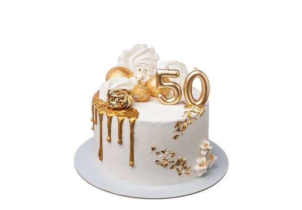 A delightful decorated white and gold cream cake for a fiftieth anniversary. On a white background close-up. — Stock Photo, Image