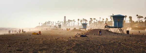 Lifeguard towers on a californian beach at sunset