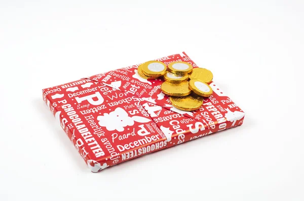 Present and chocolate coins — Stock Photo, Image