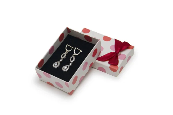 Silver earrings in a box on white background — Stock Photo, Image