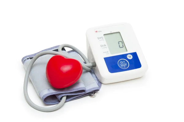 Digital blood pressure meter with love heart symbol on white background — Stock Photo, Image