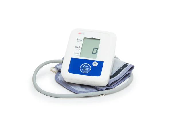 Digital blood pressure meter with love heart symbol on white background — Stock Photo, Image