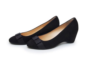 Beyaz arka planda kadın ayakkabıları