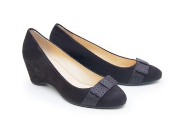 Beyaz arka planda kadın ayakkabıları