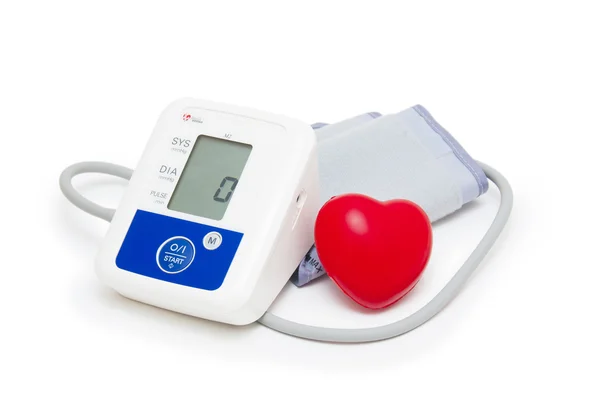 Digital blood pressure meter with love heart symbol on white background — Stock Photo, Image