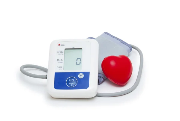 Digital blood pressure meter with love heart symbol on white background — Stock Photo, Image