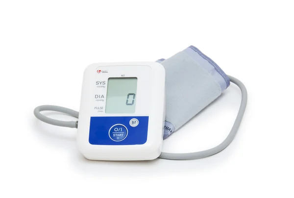 Digital blood pressure meter with love heart symbol on white background — Stock Photo, Image
