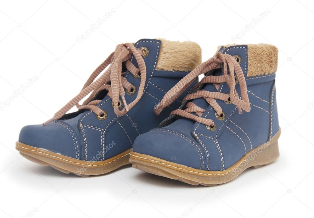 Blue childrens boots isolated on white