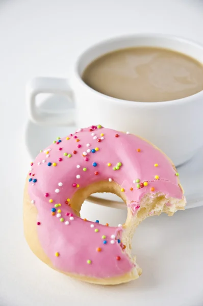 Donuts y taza de café Fotos de stock libres de derechos