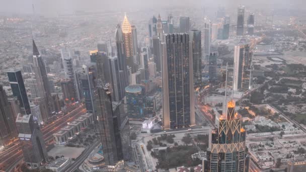 Dubai, UAE, United Arab Emirates - May 25, 2021: 4K Evening to Night timelapse. Top View City Traffic. Cityscape Skyline Big City. Dubai, UAE, United Arab Emirates. 4K Day To Night Time Lapse. City — Stock Video