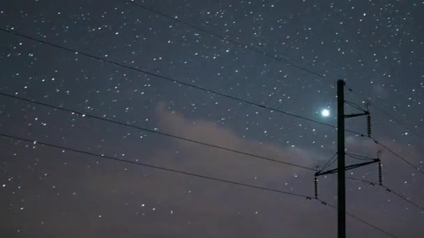 4K Нічне зоряне небо з яскравими зірками. Close Up Power Lines In Starry Sky Background Time Lapse, TimeLapse, Time-Lapse Hyperlapse — стокове відео