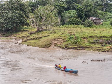 Amazon River, Peru - March 25, 2018:  Small village on the bank of the Amazon River