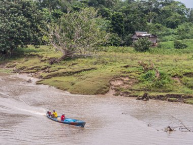 Amazon River, Peru - March 25, 2018:  Small village on the bank of the Amazon River