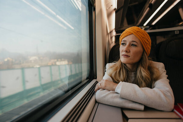 Blonde Woman Sitting Train Stock Picture