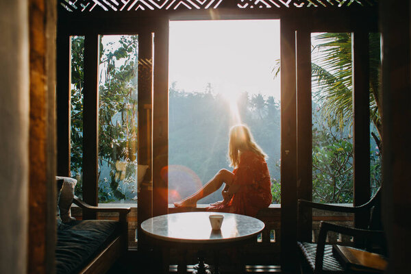 Woman Sitting Looking Sunset Stock Picture