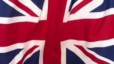 Birleşik Krallık 'ın kumaş bayrağı üzerinde ağır çekim Gerçek Britanya Ulusal Bayrağı üzerinde sallanıyor. İngiliz bayrağı 4K Full HD 'nin yavaş çekim kapanışı