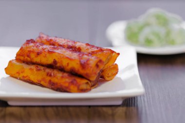 The Populous Fried Spicy popiah is spicy and crunchy in malay language is 