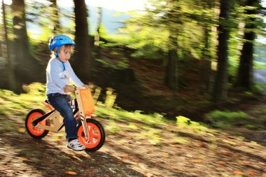 Bike Ride Through Forest clipart