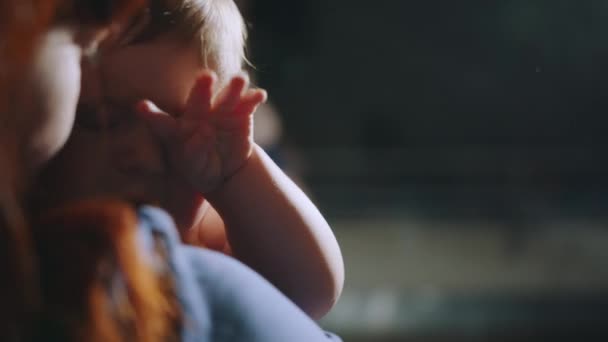 Shot Mother Caressing Kissing Affection Her Newborn Baby While Sleeping — Stock Video