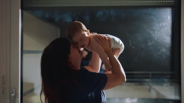 Happy Adult Mom Holding Cute Adorable Infant Child Girl Lifting — Vídeo de stock