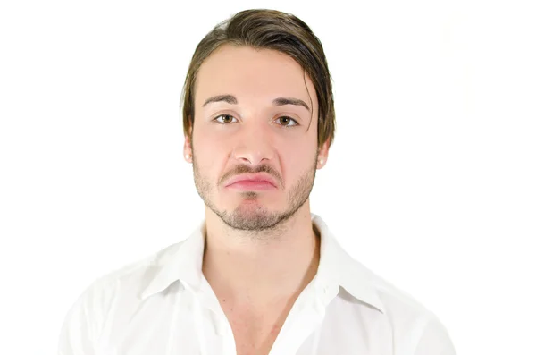 Disappointed or disgusted young man — Stock Photo, Image