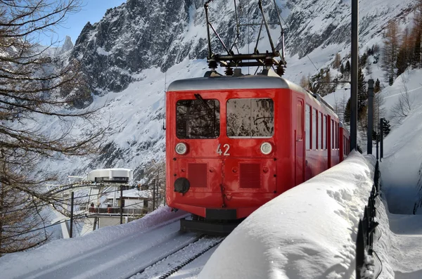 Scenic mountain train in snow — Stock Photo, Image
