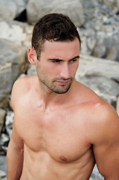 Attractive shirtless young man outdoors — Stok Foto