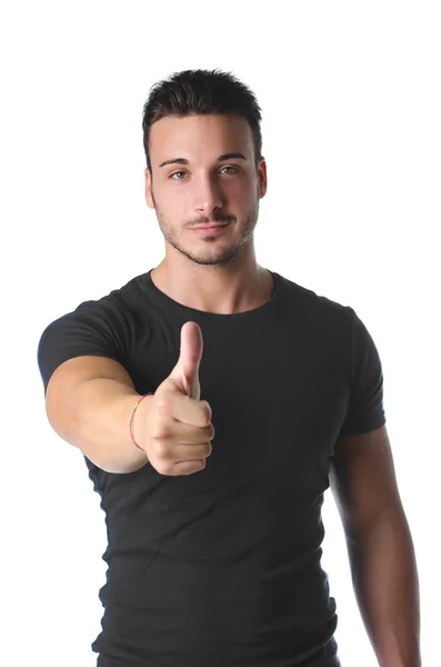 Athletic and attractive young man with thumb up doing OK sign — Stock Photo, Image