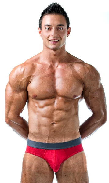 Attractive young muscle man showing athletic body — Photo