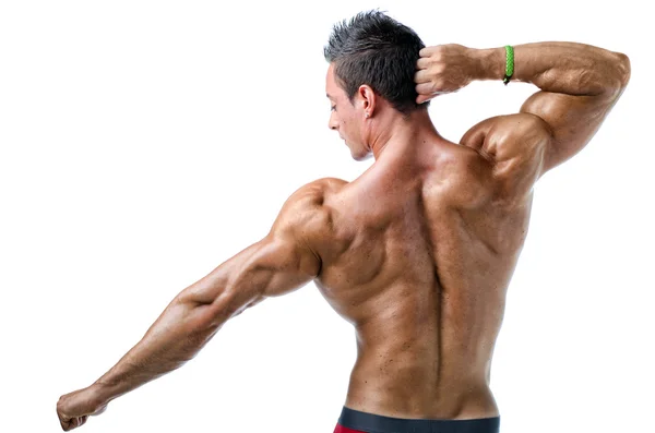 Handsome young muscle man showing muscular back — Stock Photo, Image