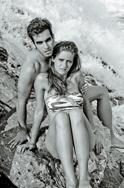 Romantic couple next to river waterfall — Stock Photo, Image