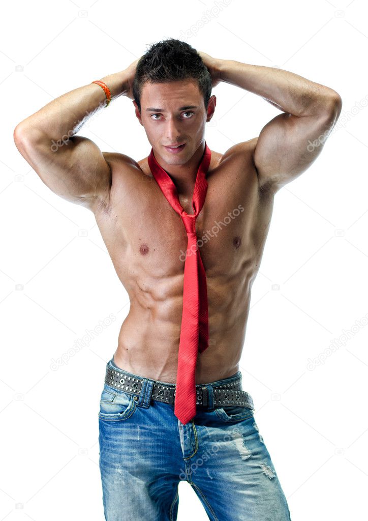 Handsome young muscle man naked, wearing only jeans and necktie