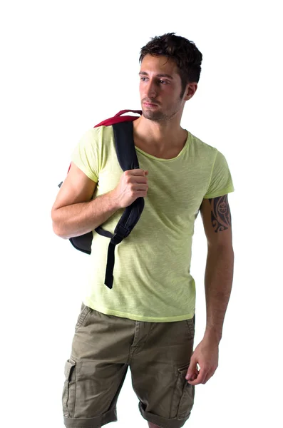 Handsome young man with backpack, isolated on white — Stock Photo, Image