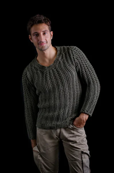 Attractive and confident young man wearing knitted sweater — Stock Photo, Image