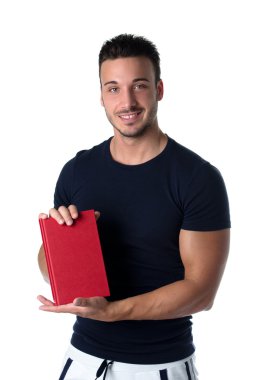 genç adam tutan gülümseyerek ve kitap kapağı gösterme