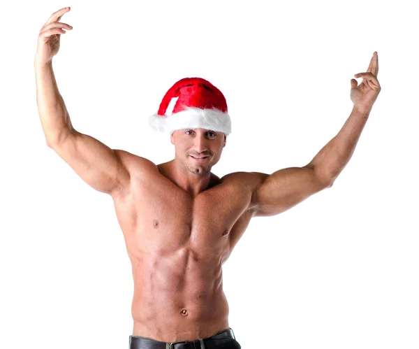 Muscular shirtless man with Santa Claus red hat — Stock Photo, Image