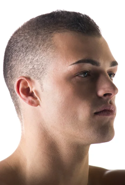 Close-up headshot of very attractive young man, looking to a side — Stock Photo, Image