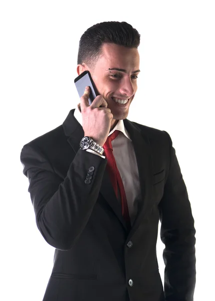 Goed uitziende zakenman praten op mobiele telefoon — Stockfoto