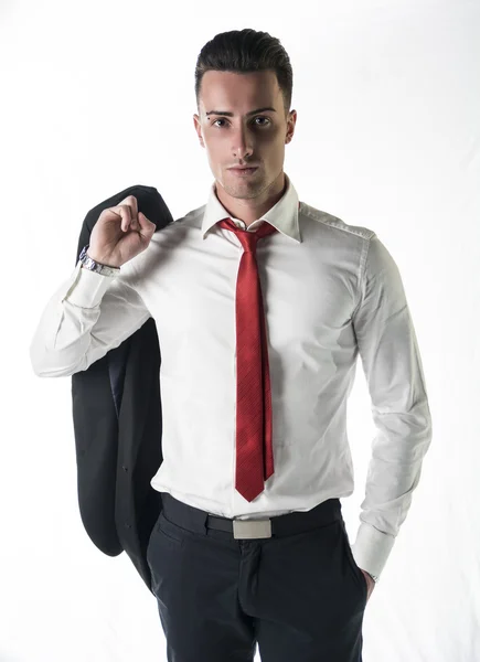 Atraktivní, vážný mladý podnikatel s sako a kravatu — Stock fotografie