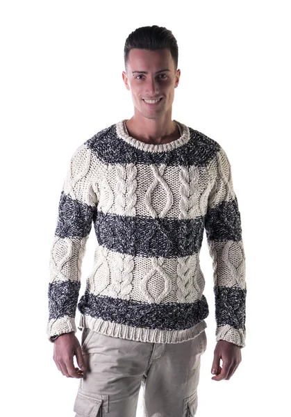 Goed uitziende jonge man permanent, het dragen van de winter trui — Stockfoto