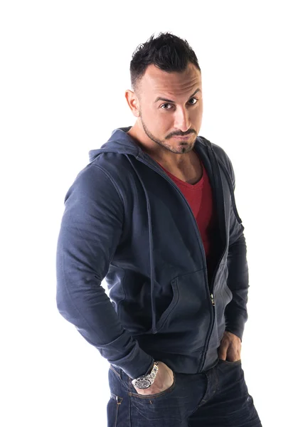 Muscular man with sweatshirt, hands in his pockets — Stock Photo, Image