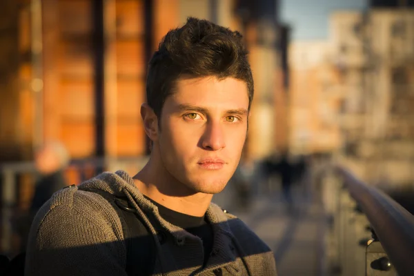 Attractive young man in urban environment — Stock Photo, Image