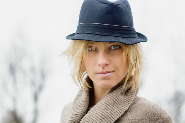 Pretty blonde girl with fedora hat — Stock Photo, Image