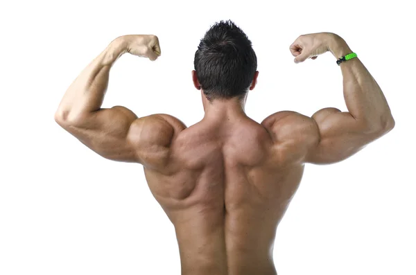 Pose de bíceps duplo volta pelo jovem fisiculturista — Fotografia de Stock