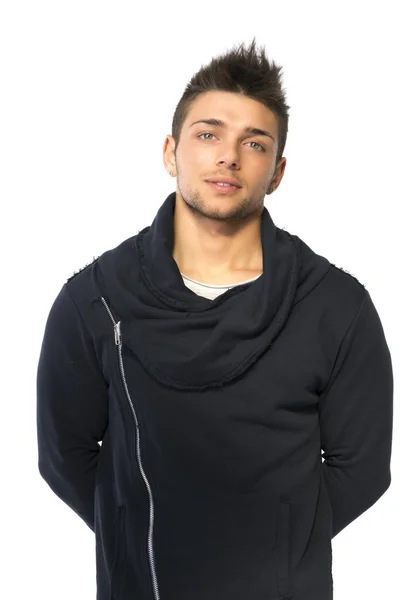Bello giovane uomo con maglione nero — Foto Stock