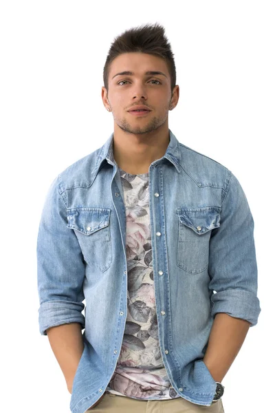 Handsome young man standing with open denim shirt — Stock Photo, Image