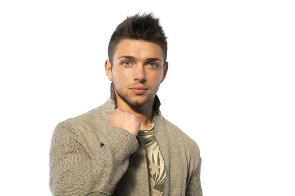 Handsome young man with wool sweater on white background — Stock Photo, Image