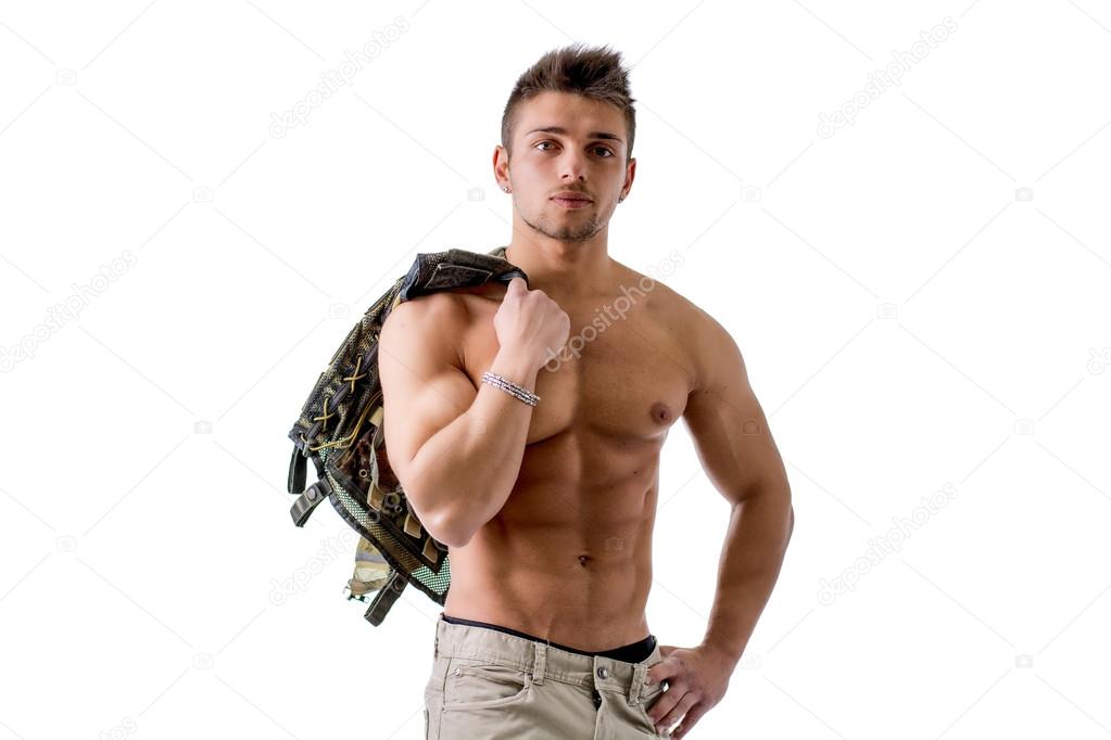 Muscular shirtless young man with military vest on shoulder