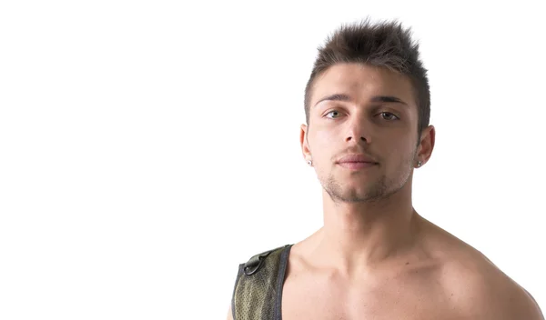 Headshot of shirtless young man with military vest on one shoulder — Stock Photo, Image